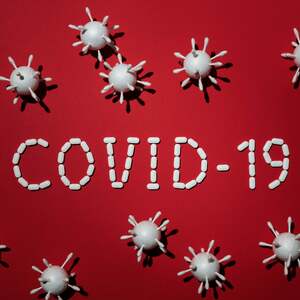 Concept of covid 19 in red background 4031867 scaled