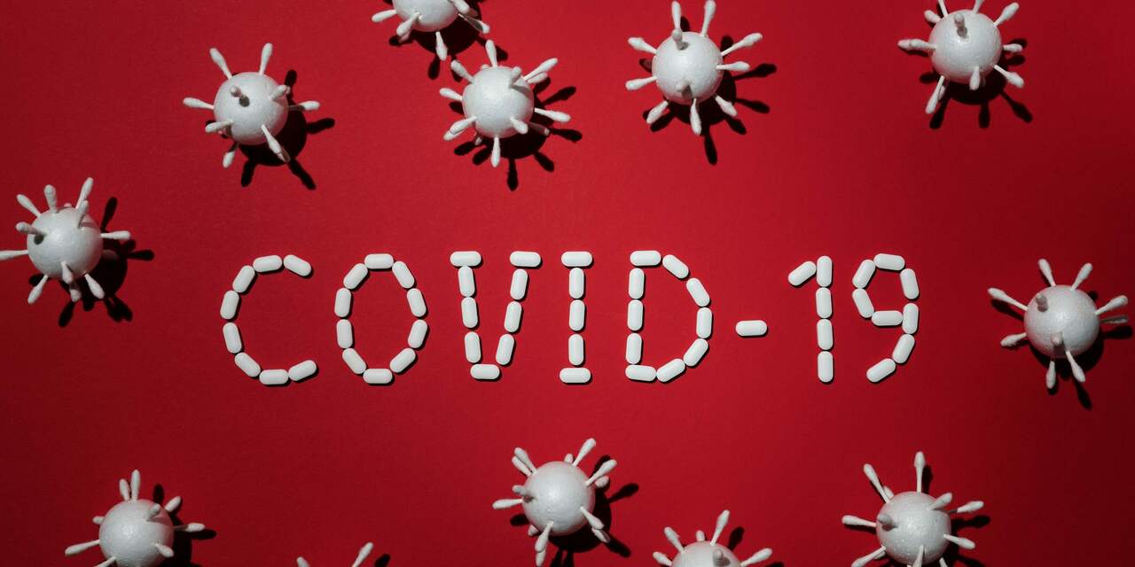 Concept of covid 19 in red background 4031867 scaled